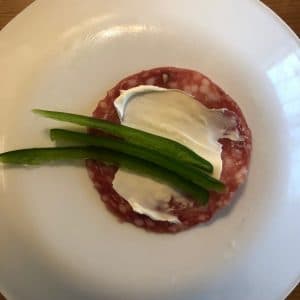 Salami slice with cream cheese and jalapeno slices